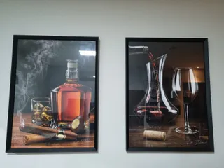 Quadro Um Bom Vinho na casa de Pedro Saravy Jr