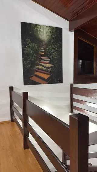 Quadro O Caminho do Conhecimento na casa de Kely Chagas