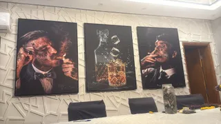 Quadro Tommy Shelby na casa de Henrique Duarte