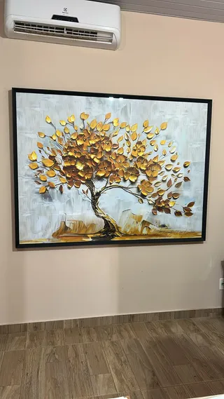 Quadro Árvore da Prosperidade na casa de Gabriela R.